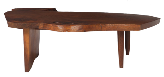 Lot 828 - George Nakashima free-form coffee table. Kamelot Auction House image.